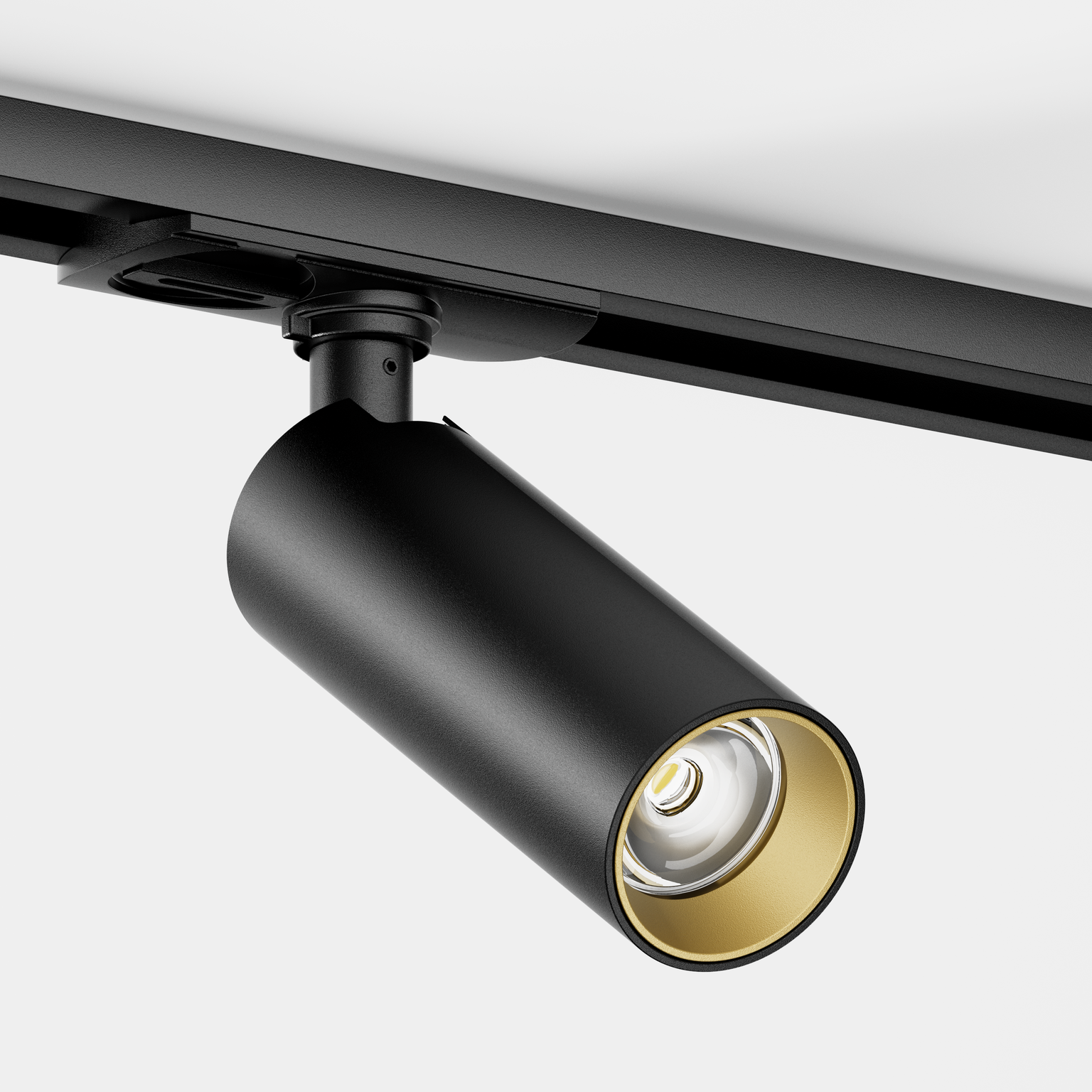Tuup Slim 1-fase railspot in het zwart, met gouden insert
