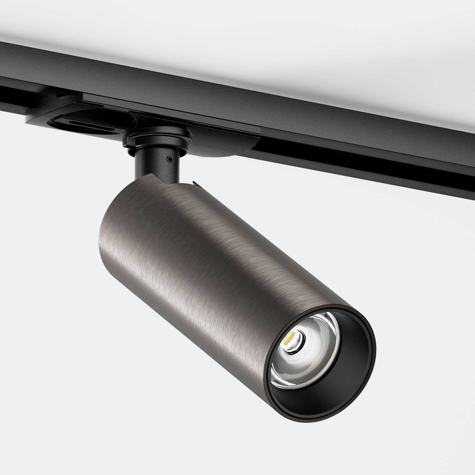 Tuup Slim 1-fase railspot in het zwart, tube geborsteld brons